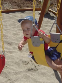 Ryan on the swings.