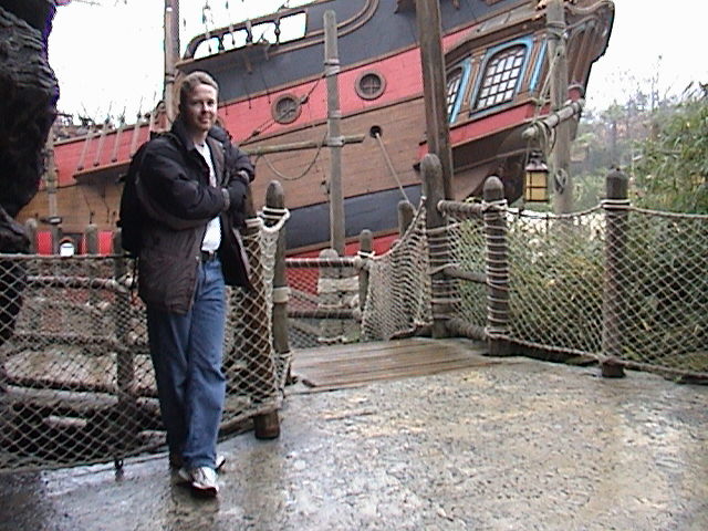Larry by the pirate ship.